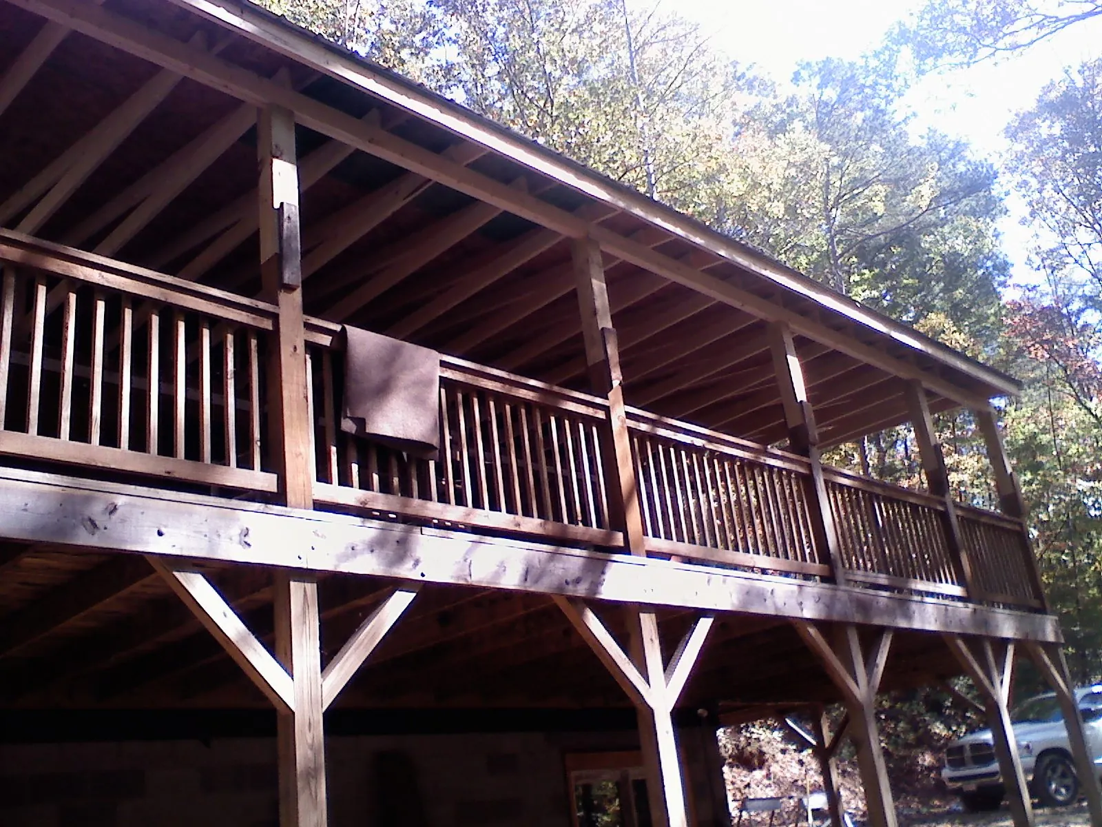 Timber framing under a new elevated porch and deck — Roof Leak Repair in Brea by Roofing Brothers